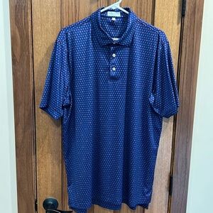 Blue polo skull printed shirt by Peter Millar. Size L.